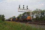 CSX 5457 leads a train under the cantilever signal bridge at Westfield NY